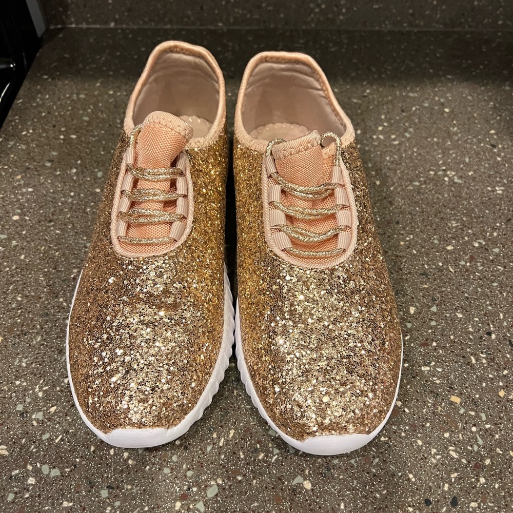 Size 7 1/2 rose gold sneakers by Forever. Worn once for a photo indoors.